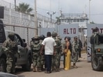 Members of the Mexican Army stand guard outside El Castillo prison following reports of a riot at the facility in Mazatlan, Mexico, on October 8.