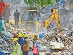 NDRF personnel and other teams conduct a rescue operation at the collapse site in Seemapuri on Thursday (Vipin Kumar/HT)