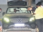 NIA officers investigate Sachin Waze's Mercedes following his arrest in 2021 in connection with the Antilia bomb scare case. 