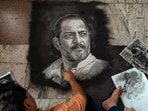 Rangoli artist Shreehari Pavale works on a rangoli portrait paying tribute to veteran actor Nana Patekar, in Vashi, Navi Mumbai, Thursday, Oct. 8, 2026.(PTI)
