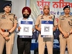 Police officials during the event at Gulzar Group of Institutions in Khanna on Friday. (HT)