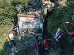 Rescue operation on after a Himachal Road Transport Corporation (HRTC) bus veered off the road and fell into a gorge at Raisharan in Shimla district on Friday morning. (HT Photo)