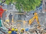 The building came down around 3.30pm on Thursday in the cramped lanes of New Seemapuri, trapping at least 11 people
