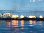 Iran warns ships beyond Hormuz as tanker attacks hit wartime high.