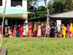 Nandigram: Women voters line up in a queue outside a polling station to cast their votes during the Assembly by-election in Nandigram constituency on Oct 6