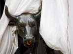File: A bronze replica of a bull is seen at the gates of the Bombay Stock Exchange (BSE) building in Mumbai 