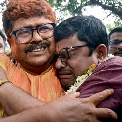  BJP candidate from Rejinagar Assembly Sakharav Sarker, right, has won the seat.