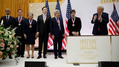 CEO of Microsoft Satya Nadella, Dell Technologies CEO Michael Dell, AMD CEO Lisa Su, Tesla and SpaceX CEO Elon Musk, NVIDIA CEO Jensen Huang, and Google co-founder Sergey Brin stand with US President Donald Trump. (REUTERS)