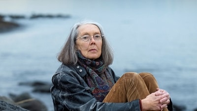 Anne Carson, winner of the Nobel Prize for Literature in 2026, sits outside her home at Aegissioa in Reykjavik, Iceland, October 26, 2023. REUTERS/Golli/Kjartan Thorbjoernsson (REUTERS)
