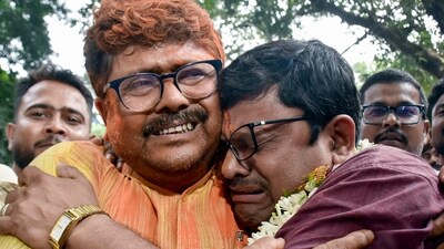 BJP candidate from Rejinagar Assembly Sakharav Sarker, right, has won the seat. (PTI)