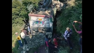 Rescue operation on after a Himachal Road Transport Corporation (HRTC) bus veered off the road and fell into a gorge at Raisharan in Shimla district on Friday morning. (HT Photo)