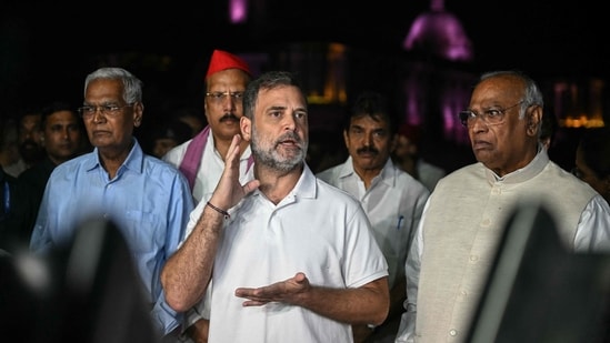 Congress leader Rahul Gandhi (C) along with leaders of the opposition alliance INDIA bloc (Indian National Developmental Inclusive Alliance) speaks with media outside the Rashtrapati Bhavan as they demand the resignation of Chief Election Commissioner over alleged "special intensive revision" (SIR) voter-roll irregularities.