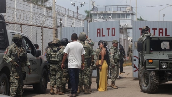 Members of the Mexican Army stand guard outside El Castillo prison following reports of a riot at the facility in Mazatlan, Mexico, on October 8.