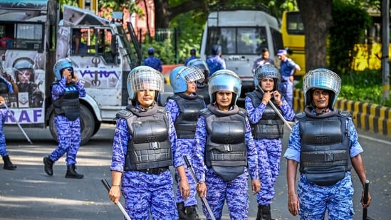 Security personnel are seen deployed in large numbers near Jantar Mantar, as roads leading to the protest site remain closed and barricaded amid heightened security arrangements ahead of a protest called by the Cockroach Janta Party (CJP) in New Delhi.