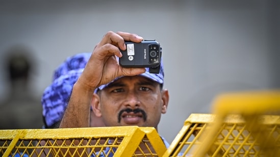 Security personnel are seen deployed in large numbers near Jantar Mantar, as roads leading to the protest site remain closed and barricaded amid heightened security arrangements ahead of a protest called by the Cockroach Janta Party (CJP) in New Delhi.