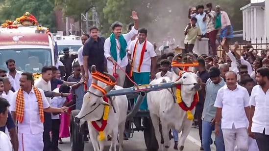 Election results Tamil Nadu LIVE: In this screengrab from a video released on Oct 4, Tamil Nadu CM C Joseph Vijay drives a bullock cart alongside party leaders KG Arunraj and C Vijayabaskar during a campaign roadshow ahead of the Dharapuram Assembly constituency by-election Election results Tamil Nadu LIVE: In this screengrab from a video released on Oct 4, Tamil Nadu CM C Joseph Vijay drives a bullock cart alongside party leaders KG Arunraj and C Vijayabaskar during a campaign roadshow ahead of the Dharapuram Assembly constituency by-election