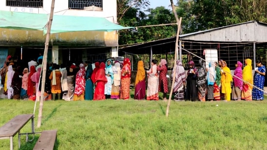 Nandigram: Women voters line up in a queue outside a polling station to cast their votes during the Assembly by-election in Nandigram constituency on Oct 6 Nandigram: Women voters line up in a queue outside a polling station to cast their votes during the Assembly by-election in Nandigram constituency on Oct 6