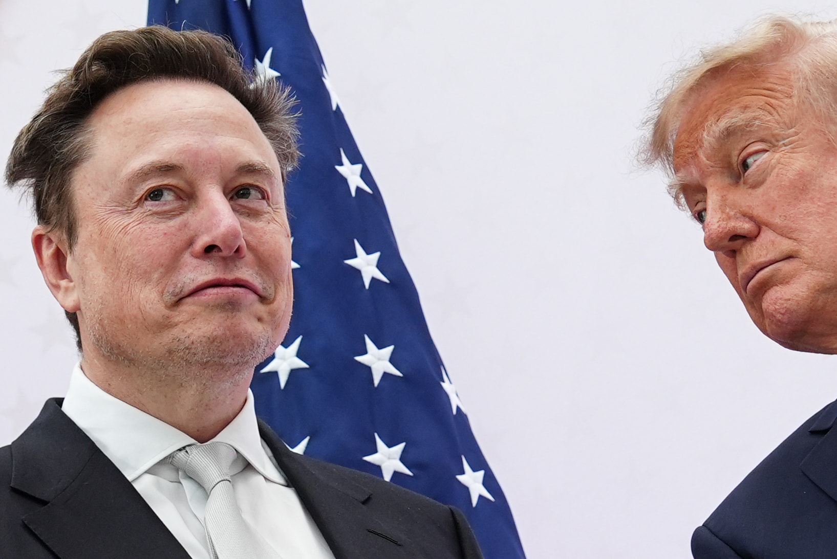 President Donald Trump, right, presents the National Medal of Science to Elon Musk at the U.S. Institute of Peace. (AP Photo/Julia Demaree Nikhinson)