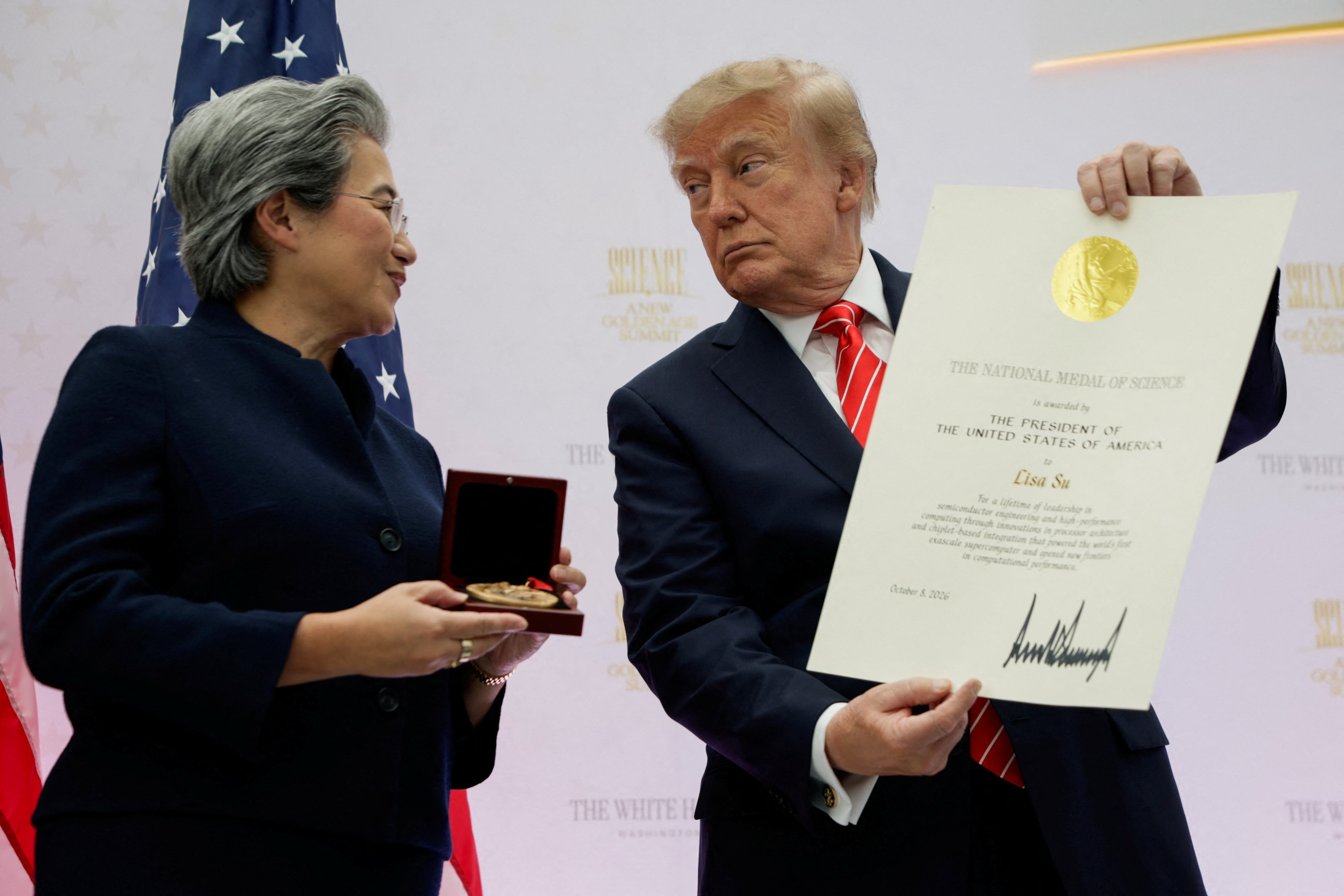 US President Donald Trump presents AMD CEO Lisa Su with the National Medal of Science during the "A New Golden Age" summit at the US Institute of Peace. (REUTERS)