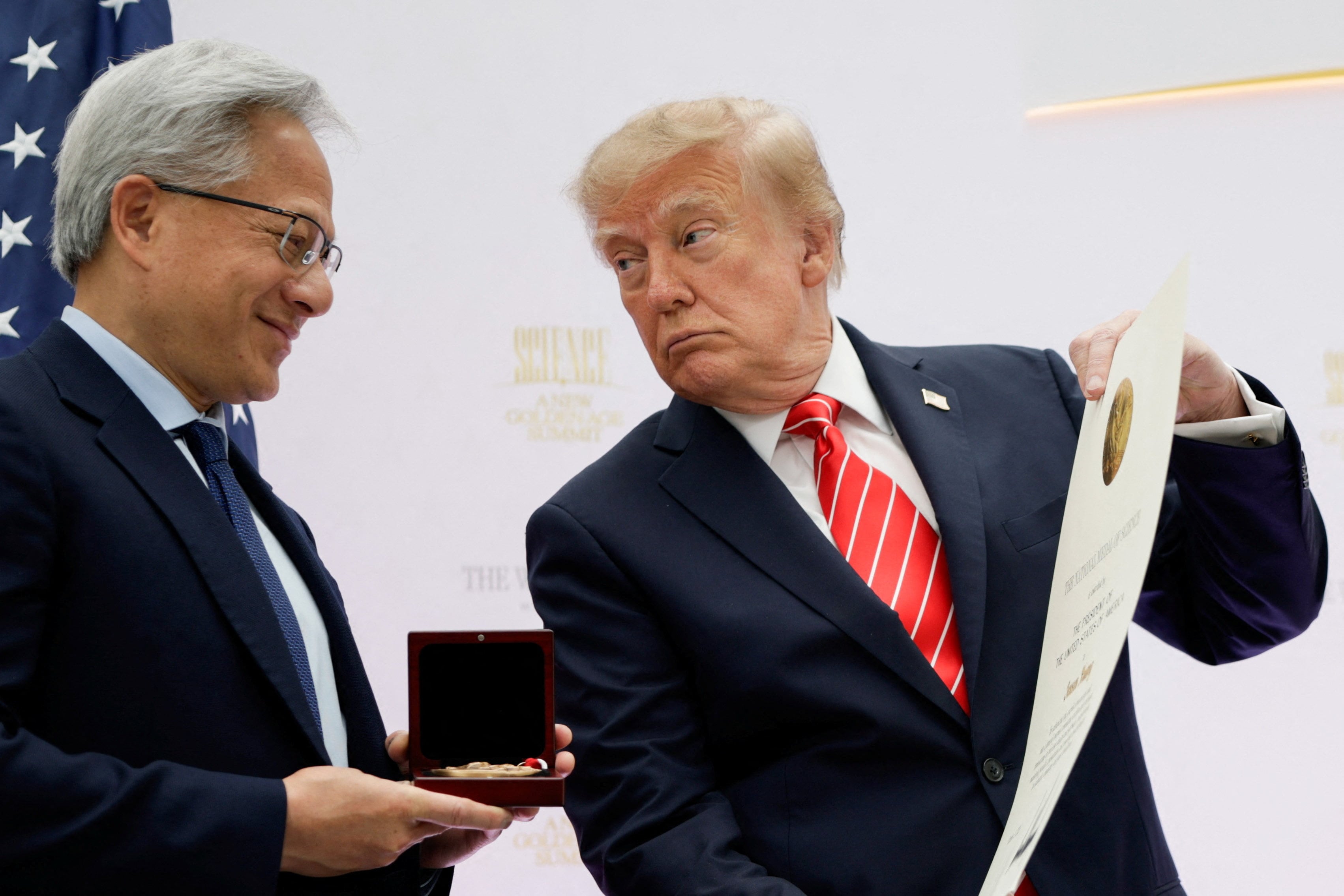 US President Donald Trump presents the National Medal of Science to Nvidia CEO Jensen Huang. (REUTERS)