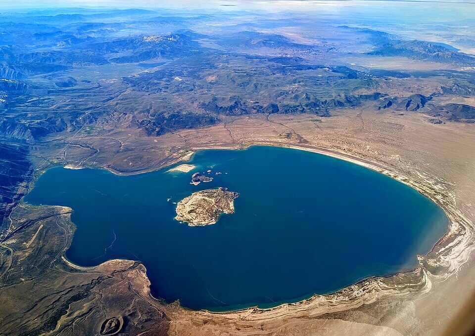 From above, Mono Lake looks calm, but its level is still below the state’s 6,392-foot goal. (Wikimedia Commons) From above, Mono Lake looks calm, but its level is still below the state’s 6,392-foot goal. (Wikimedia Commons)