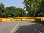 A deserted view of Delhi Police barricades placed near the Jantar Mantar area amid tight security arrangements for the CJP protest, in New Delhi on Saturday. 