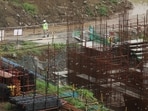 A worker walks at the site of an Amazon data centre in Thane, India. (REUTERS)