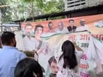 BJP women’s wing on October 10 tore Congress party posters and hoardings outside the UP Congress office in Lucknow. (Sourced)