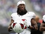 Marvin Harrison Jr. will miss Sunday's Cardinals-Lions game as Arizona works on a trade, with Houston among the possible destinations. (AP Photo/Adam Hunger)