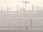 Gram it: On Friday, a Metro train was spotted plying amid low visibility caused by smog and rising air pollution in Gurugram. According to Central Pollution Control Board (CPCB), Delhi’s Air Quality Index stood at 177 in the moderate category. With winter approaching, the city’s residents are anticipating yet another smog season ahead. Several restrictions have already been announced to discourage the use of personal vehicles, starting November.(Photo: PTI)