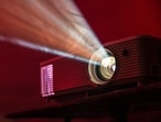 Want a bigger screen without buying a bigger TV. Try out a projector.(Unsplash)