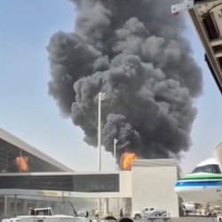 Smoke and flames rise from King Khalid Airport, after Yemen’s Iran-backed Houthis said they attacked the airport, in Riyadh, Saudi Arabia. 