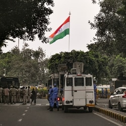 Security personnel and police vehicles stationed in Connaught Place to maintain law and order following the Cockroach Janta Party's (CJP) anti-CEC protest demonstration, in New Delhi, Saturday, Oct. 10, 2026.