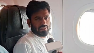 Cockroach Janta Party (CJP) Founder Abhijeet Dipke detain by the Police after the flight landed at IGI Airport, in New Delhi on Saturday. (ANI Video Grab) (ANI Video Grab)