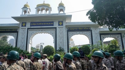 Security personnel stand guard outside the entrance gate of Gurdwara Bangla Sahib in New Delhi, Saturday, Oct. 10, 2026. (PTI) Security personnel stand guard outside the entrance gate of Gurdwara Bangla Sahib in New Delhi, Saturday, Oct. 10, 2026. (PTI)