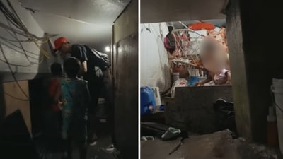 There are about 100 families living inside the jam-packed tunnel beneath a Manila highway. (YouTube/ Drew Binsky)