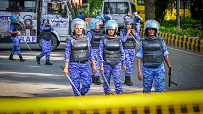 Security personnel are seen deployed in large numbers near Jantar Mantar, as roads leading to the protest site remain closed and barricaded amid heightened security arrangements. (Hindustan Times) Security personnel are seen deployed in large numbers near Jantar Mantar, as roads leading to the protest site remain closed and barricaded amid heightened security arrangements. (Hindustan Times)