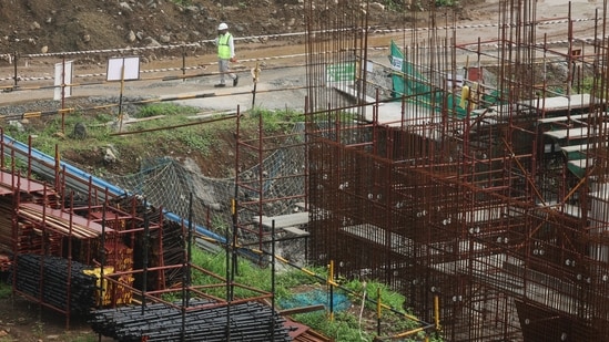 A worker walks at the site of an Amazon data centre in Thane, India. (REUTERS)