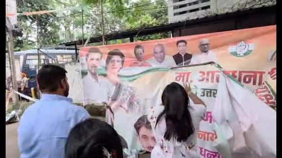 BJP women’s wing on October 10 tore Congress party posters and hoardings outside the UP Congress office in Lucknow. (Sourced)