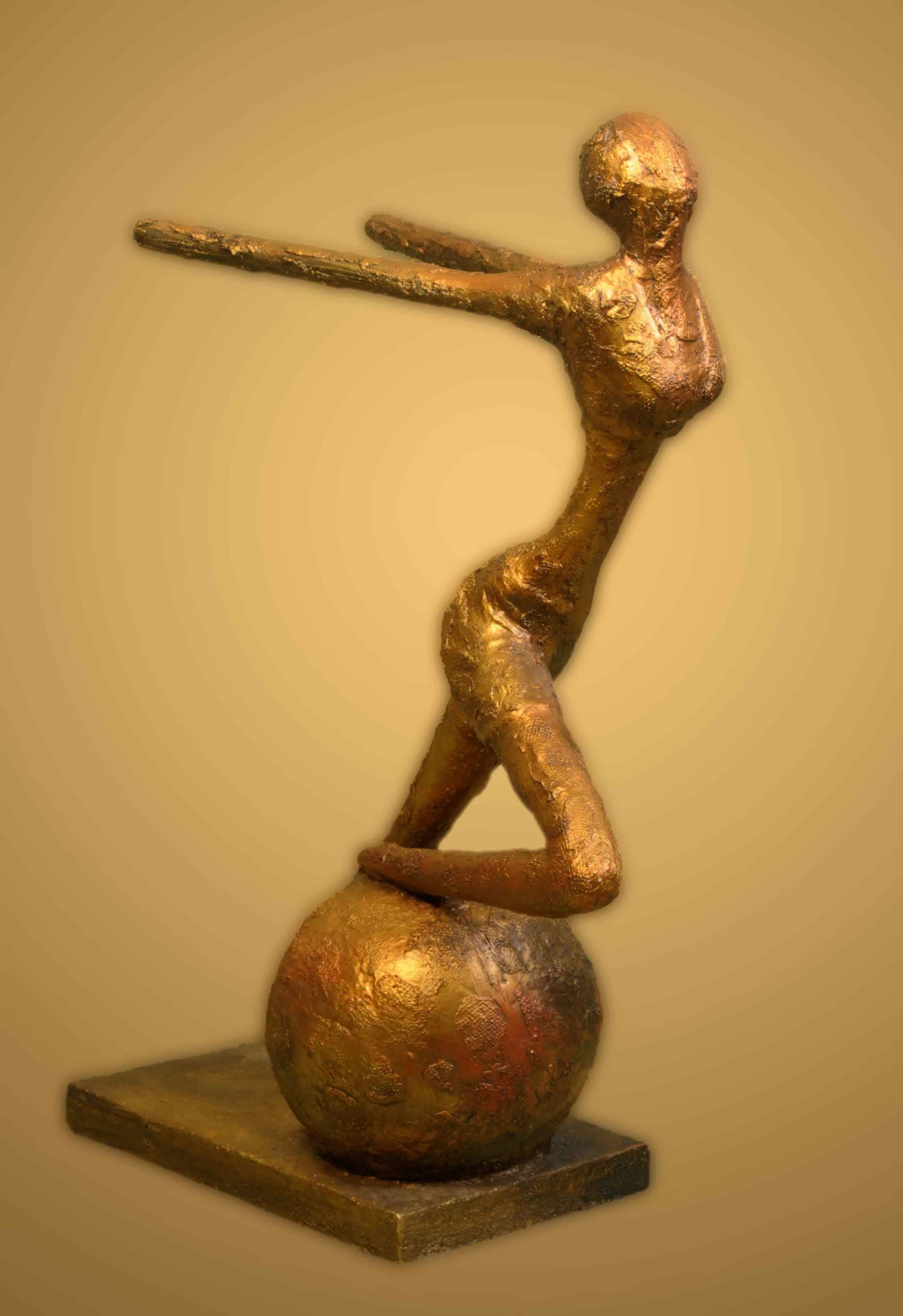 This sculpture titled Freedom, by Anju Kumar, showcases a woman with her hands stretched backwards and her feet on the globe.