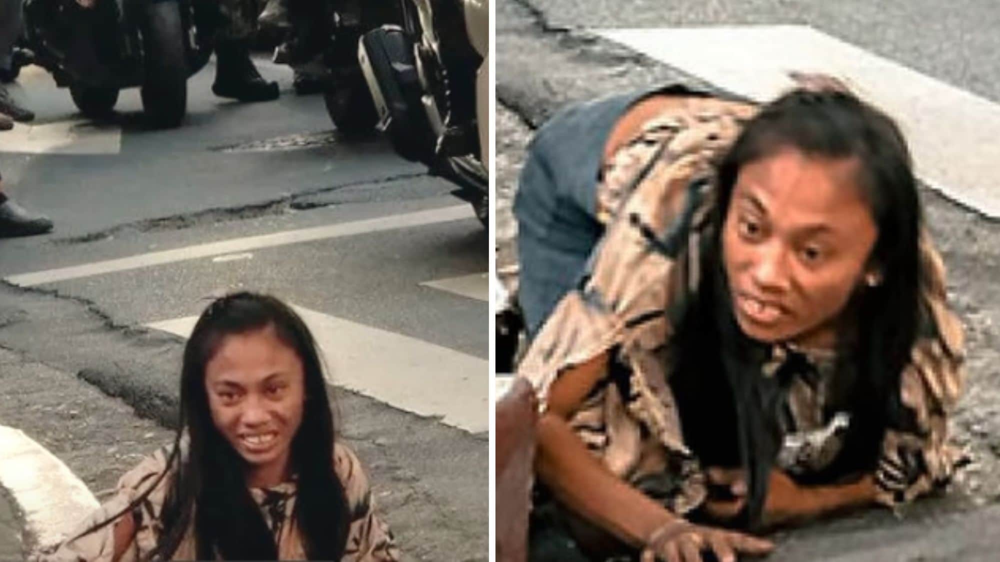 A woman uses a hole in the side of a Manila highway as a door to her home underground. (Instagram/@docuspherenet)