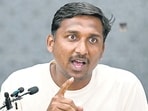 Cockroach Janata Party (CJP) leader Ajinkya Shinde addresses a press conference during a protest demanding the resignation of India’s Chief Election Commissioner Gyanesh Kumar over alleged voter roll irregularities linked to the "special intensive revision" (SIR), near Jantar Mantar in New Delhi on October 10, 2026. (Photo by Arun SANKAR / AFP) (AFP)