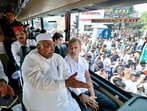 Congress president Mallikarjun Kharge and Lok Sabha LoP Rahul Gandhi sit inside a bus while travelling to Raj Ghat to protest against Chief Election Commissioner Gyanesh Kumar. (ANI)