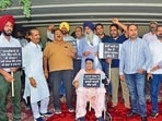 Councillors protesting outside the Guru Nanak Dev Bhawan in Ludhiana on Saturday. (Gurpreet Singh/HT)