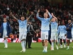 Manchester City's players celebrate on the pitch after the English Premier League football match between Liverpool and Manchester City at Anfield in Liverpool, north west England on October 11(AFP)