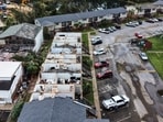 Hurricane Isaias killed four people, damaged buildings, triggered widespread power outages and raised flooding concerns across the Southeast. (AP Photo/Gerald Herbert)(AP Photo/Gerald Herbert)