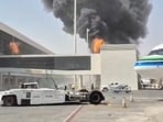 Smoke and flames rise from King Khalid Airport, after Yemen's Iran-backed Houthis said they attacked the airport, in Riyadh, Saudi Arabia.