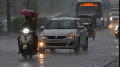 Commuters drenched during rain in Ludhiana on Sunday. (Gurpreet Singh/HT)