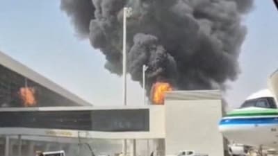 Smoke and flames rise from King Khalid Airport, after Yemen’s Iran-backed Houthis said they attacked the airport, in Riyadh, Saudi Arabia. (Social Media via REUTERS)