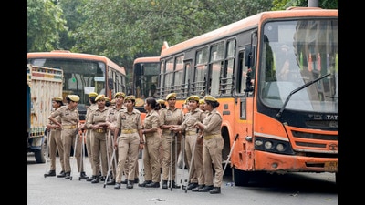Police personnel stand guard near Gurdwara Bangla Sahib in New Delhi on Sunday. (PTI) Police personnel stand guard near Gurdwara Bangla Sahib in New Delhi on Sunday. (PTI)